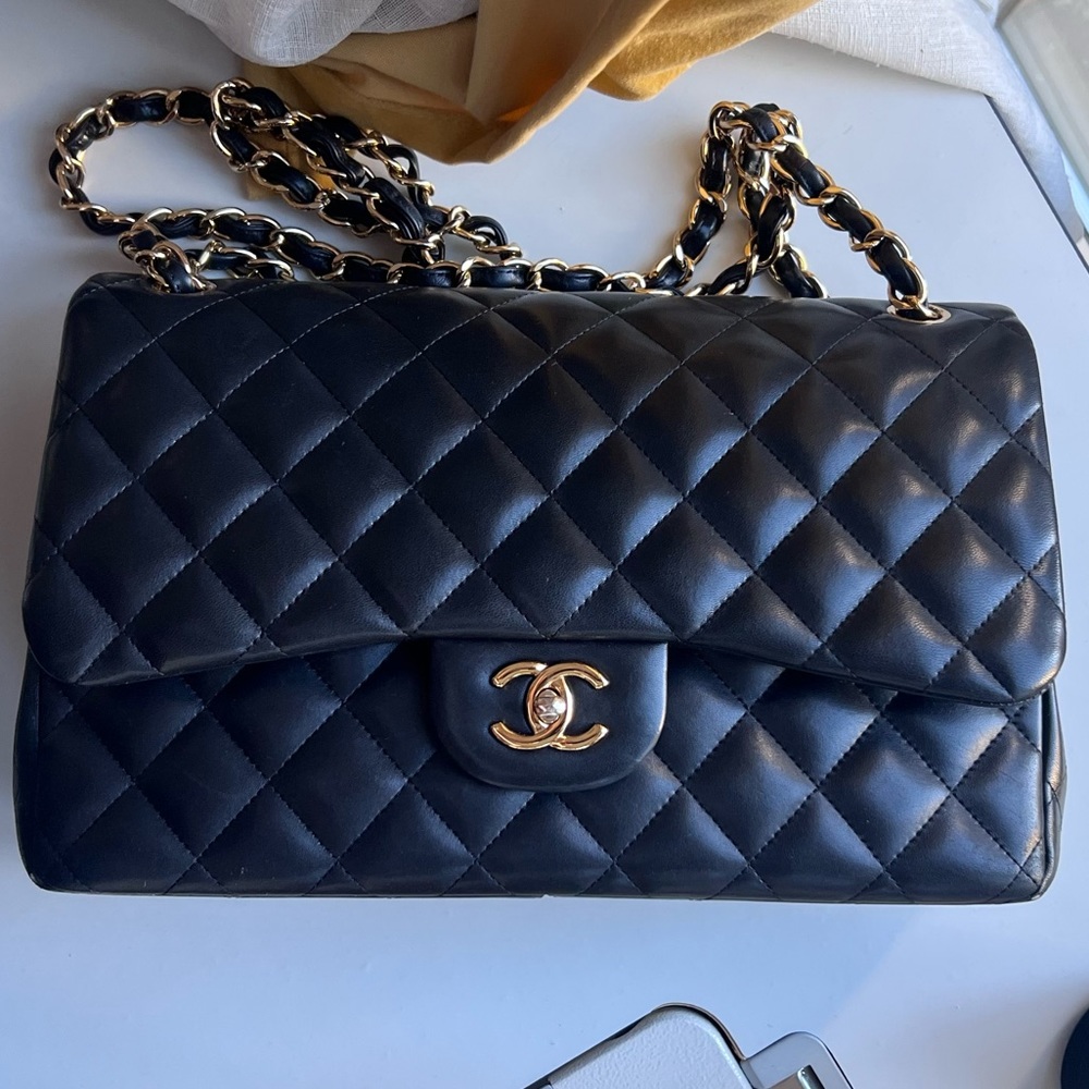 Chanel
Black Quilted Caviar Jumbo Classic Double Flap Gold Hardware, 2014